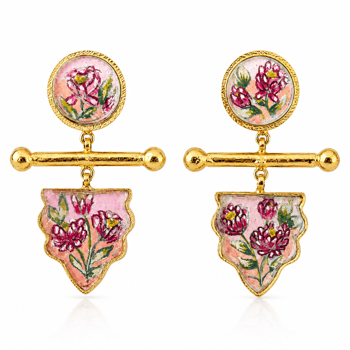 GUL earrings with round floral studs, gold-tone bars and scalloped pink pendants decorated with flowers, displayed on white.