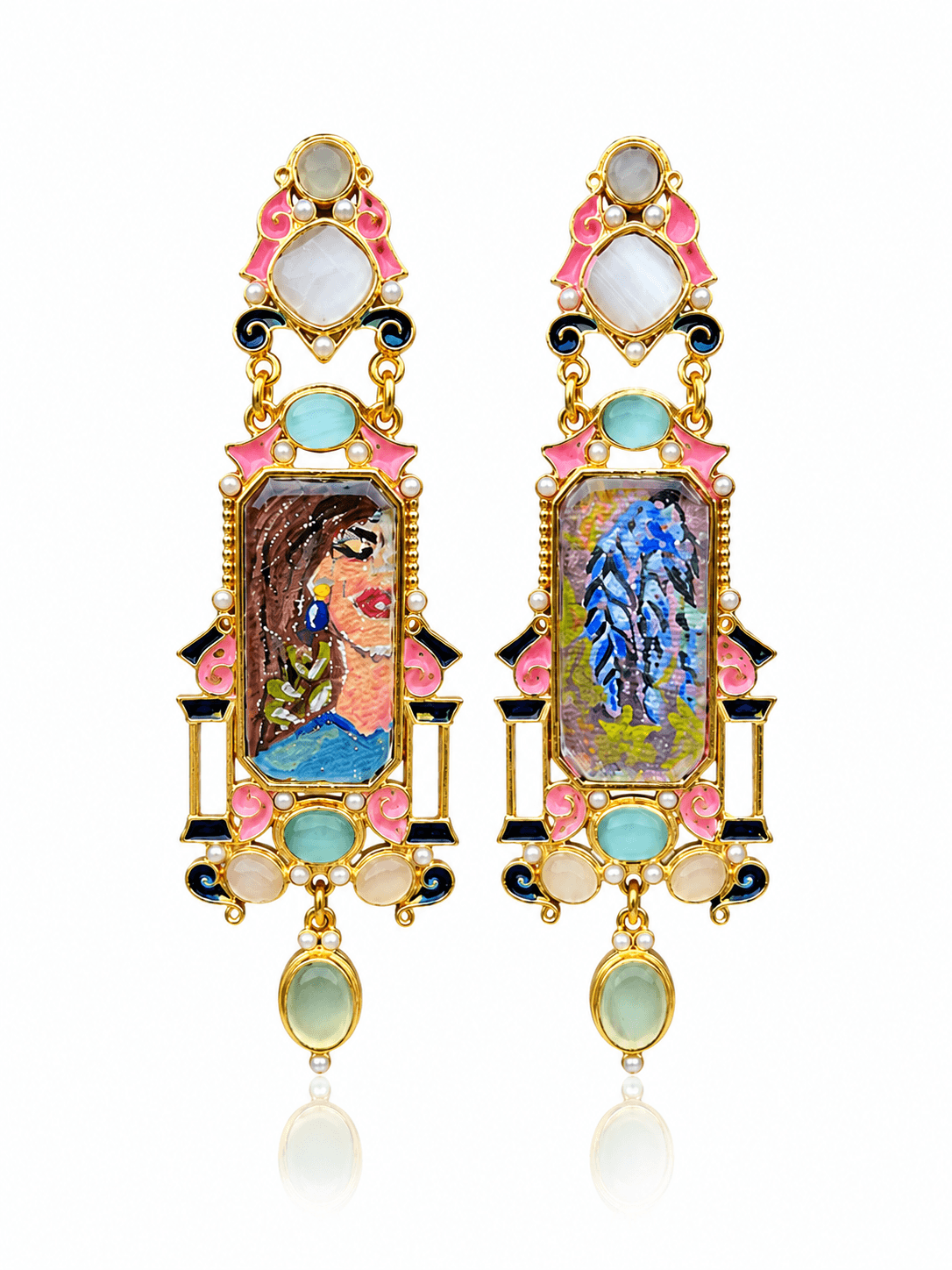 NIGAAR long gold-tone earrings with portrait and bird artwork, pink and blue details and oval green drops on white.